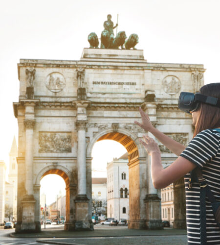 Girl tourist in glasses virtual reality trip to germany