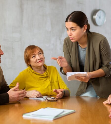 Female Teacher Explaining Subject