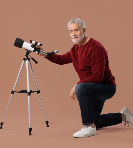 Senior Astronomer With Telescope